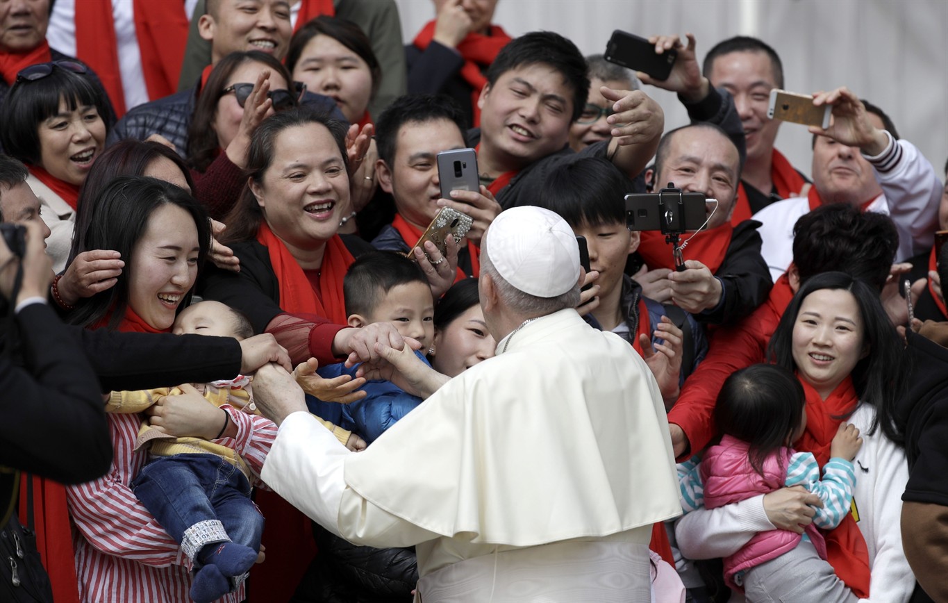 Pope Francis meets a group of faithful from China