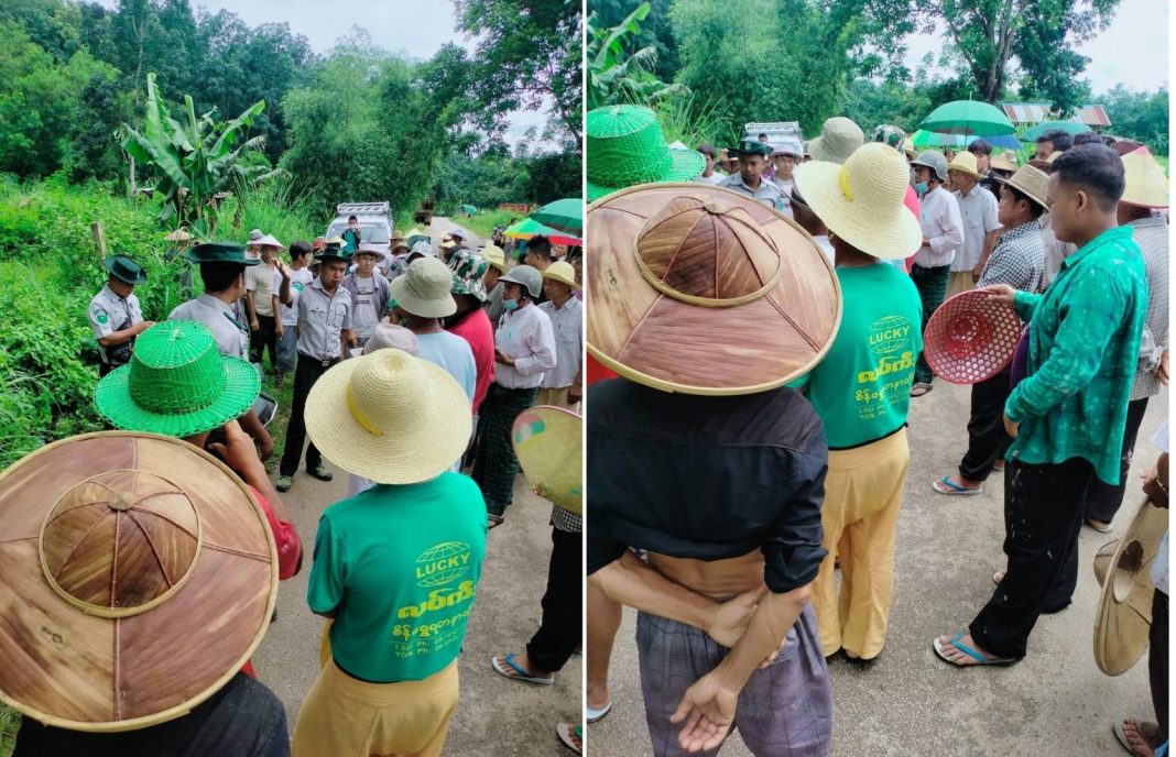 Hopang people protest against local authority grabbing their farmland.