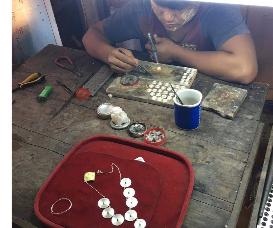 Silversmith designs handicraft on Inle Lake