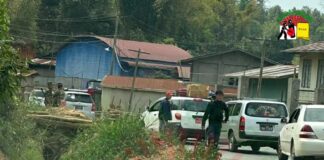 TNLA Extorting Money From Drivers And Occupying Houses In Muse Township TMLA soldiers collect tax from drivers on the road between Nam Kham Muse Photo SHAN