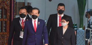 Divergent Paths: Contrasting Democratic Transformations in Myanmar and Indonesia President Joko Widodo (Jokowi) and Foreign Minister Retno Marsudi Photo Reuters