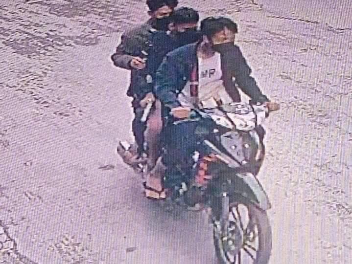 Three unidentified assailants on motorcycles