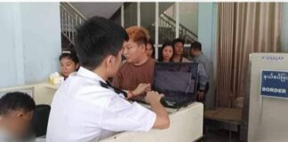 The Rush to Enter China for Job Opportunities Amidst Turmoil People lining up to register for one time use Temporary Borderpass