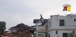 KIA Defeats SAC in Namphakka Houses damaged by war