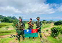 SAC Continues Shelling Hsihseng Town PNLA soldiers hold Pa O flag