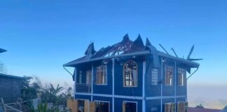 Local Man and Baby Killed by Junta Shelling in Hsihseng Township Villagers in front of the damaged house, in Hsihseng township, southern Shan State