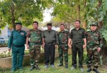 TLNA and SSPP Leaders Convene at UWSA Headquarters to Resolve Disputes SSPP and TNLA leaders hold hands