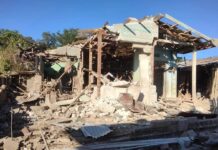 Five Injured in Mongngaw Town Airstrike in Northern Shan State Building damaged by bomb in Mongngaw