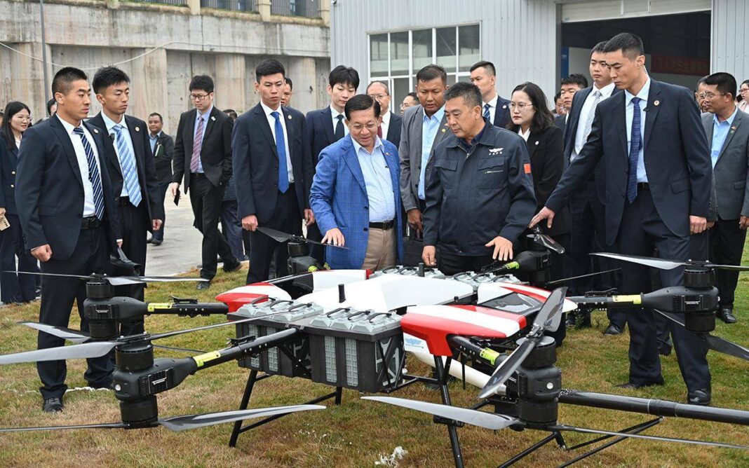 Min Aung Hlaing observes drone in China