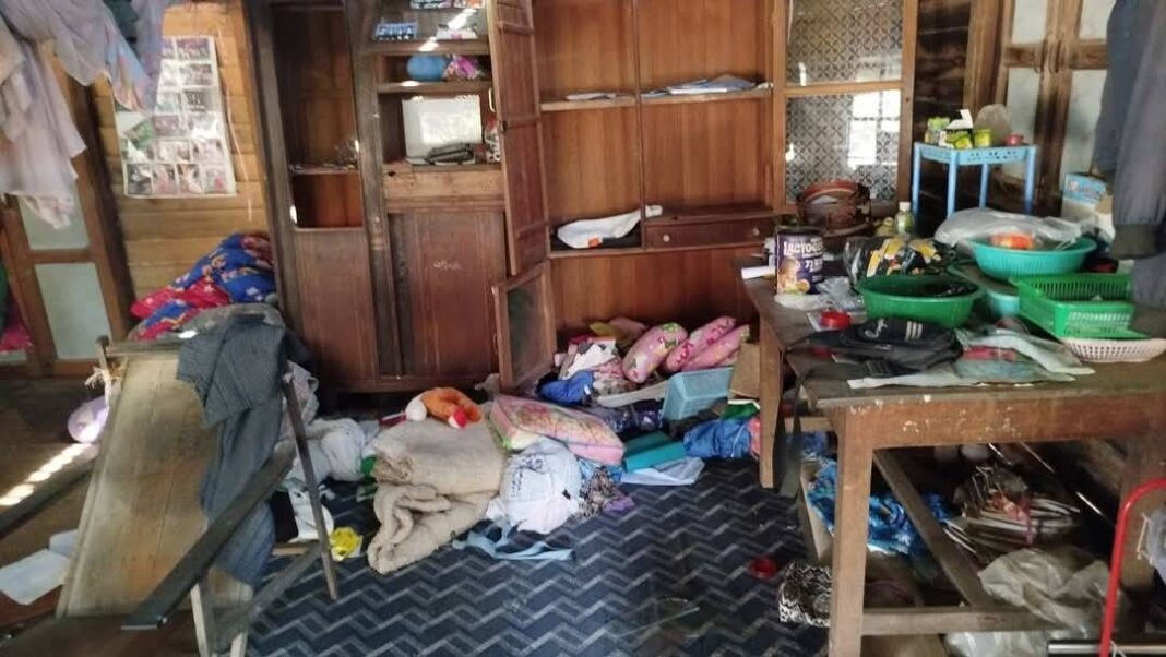 Junta soldiers looting villagers' homes