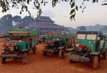 Junta Demands Money at Checkpoints on Shan State Highway Trucks parking at a temple in Lawksawk