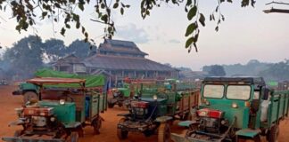 Junta Demands Money at Checkpoints on Shan State Highway Trucks parking at a temple in Lawksawk