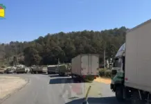Military Police Accused of Extortion and Threats at Loilem Toll Gate The trucks on the road Taunggyi Loilem