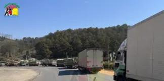 Military Police Accused of Extortion and Threats at Loilem Toll Gate The trucks on the road Taunggyi Loilem