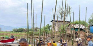 Inle Residents Struggle to Rebuild Amid Shifting Ground After Earthquake Villagers re building a house