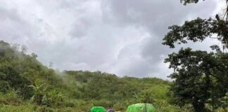 SAC Imposes Heavy Fees on Unlicensed Vehicles in Northern Shan State Vehicles on a muddy road in Shan State