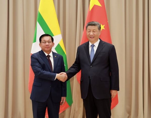 Junta leader Min Aung Hlaing meets with Xi Jinping