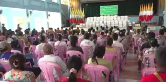 Junta Seizes Majority of Food Aid Donated to Lashio IDPs IDPs present during junta aid distribution at the Shan Literature and Culture Hall in Lashio