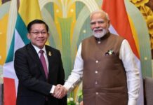 MILITARY JUNTA’S PRE-ELECTION HEATS UP: Majority of EAOs and anti-junta forces against the election Min Aung Hlaing shakes hands with India’s Prime Minister Narendra Modi