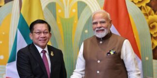 MILITARY JUNTA’S PRE-ELECTION HEATS UP: Majority of EAOs and anti-junta forces against the election Min Aung Hlaing shakes hands with India’s Prime Minister Narendra Modi