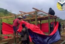 Thousands Displaced in Pai Khun Face Winter Hardship Displaced families and volunteers help build temporary shelters in Pai Khun