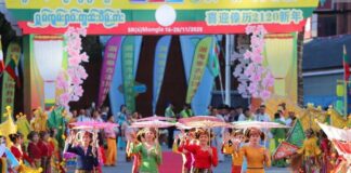SHAN NEW YEAR 2120: Shan unity and TNLA overtures Shan women in traditional dress warmly greet the crowd in Mong La during the 2120 Shan New Year celebration