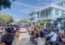 No Vote, No Documents: Muse Residents Threatened Ahead of Junta-Staged Election Crowds of people apply for passports and border passes in Muse Township