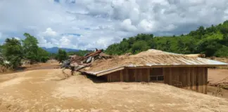 Poisoned Rivers, Empty Promises: Environment Absent from Junta Election Campaigns Flood damaged homes in the area