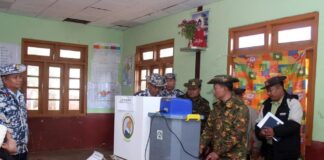 Regional Commander Accused of Pressuring Voters on Election Eve in Namsang Military personnel inspect a polling station ahead of voting in Namsang