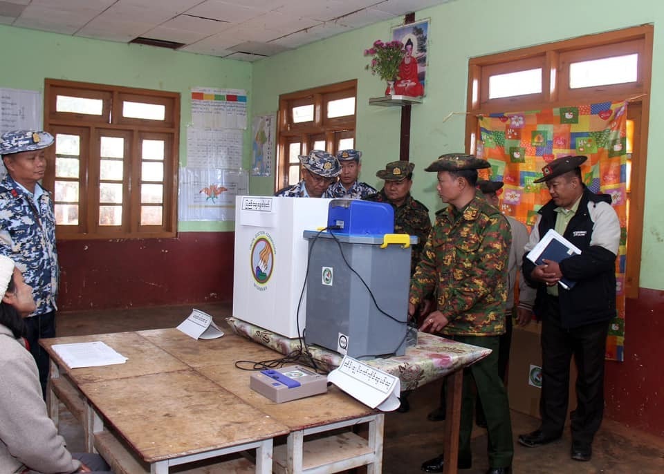 Military personnel inspect a polling station ahead of voting in Namsang