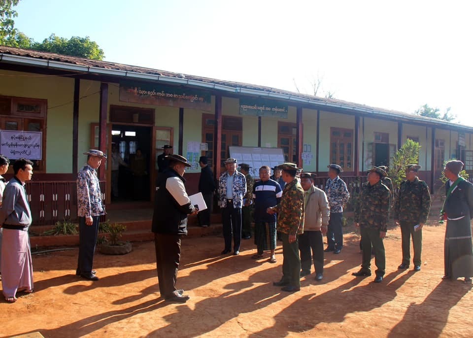 Military personnel inspect a polling station ahead of voting in Namsang