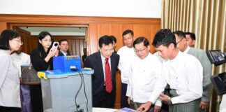 IDPs Fear Arrest and Forced Conscription as Junta Collects Data Before Election Min Aung Hlaing showcases the regime’s electronic voting machine