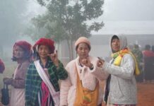 Reports of Heavy Security and Alleged Coercion During Voting in Southern Shan State Residents are seen at a polling station set up by the military authorities