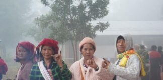 Reports of Heavy Security and Alleged Coercion During Voting in Southern Shan State Residents are seen at a polling station set up by the military authorities