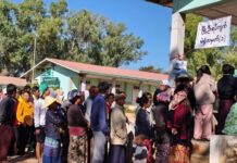 Fears of Proxy Voting Rise as Authorities Collect Lists of Sick Residents in Southern Shan State Residents in Hopong are seen at a polling station set up by the military authorities
