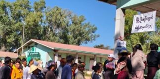 Fears of Proxy Voting Rise as Authorities Collect Lists of Sick Residents in Southern Shan State Residents in Hopong are seen at a polling station set up by the military authorities