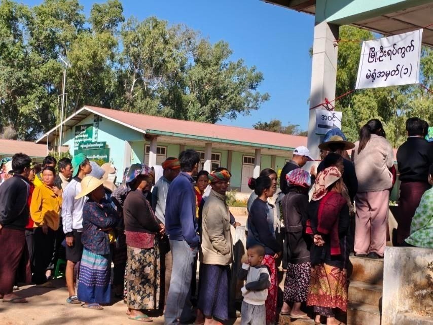 Residents in Hopong are seen at a polling station set up by the military authorities