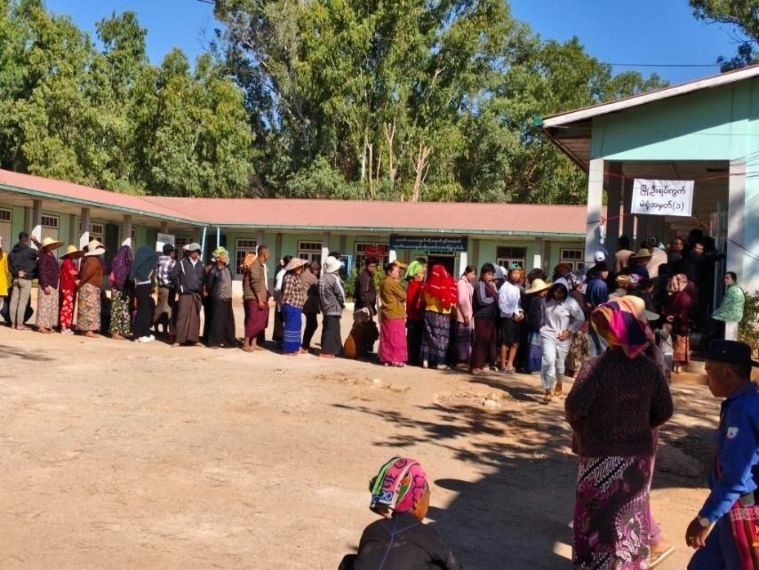 Residents in Hopong are seen at a polling station set up by the military authorities