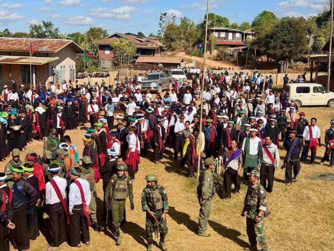 PNO militiamen with civilians in southern Shan State PNO militiamen with civilians in southern Shan State