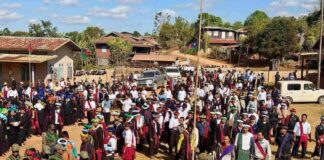 Fear of Extortion Looms as PNO Enters Kalaw Election Race PNO militiamen with civilians in southern Shan State