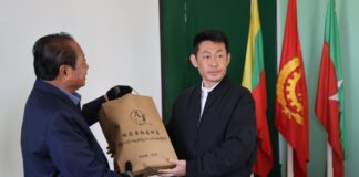 Five Villagers Still Held by MNDAA After Anti-Mining Protest in Northern Shan SSPPSSA Chairman Sao Pang Pha receives a ceremonial gift from an MNDAA representative