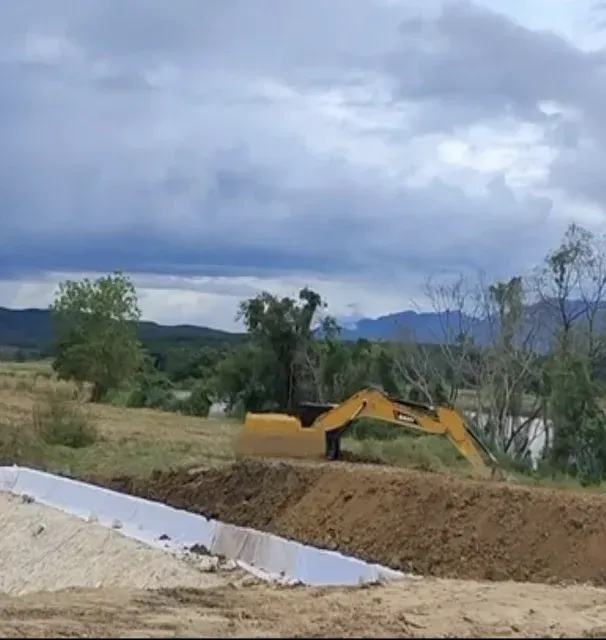 Ongoing construction linked to a power plant near the Kok River, mid March 2026