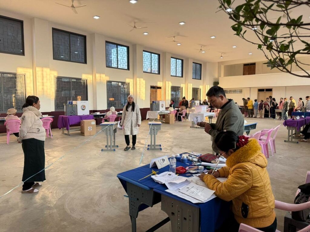 People line up to cast their votes at a polling station during Myanmar’s election