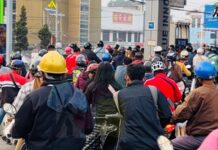 Fuel Crisis and Driving Restrictions Disrupt Daily Life Across Shan State Residents line up to buy petrol at a fuel station amid ongoing fuel shortages