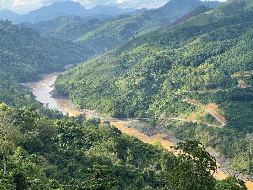 The Salween River flows through rugged landscapes, sustaining communities along its banks
