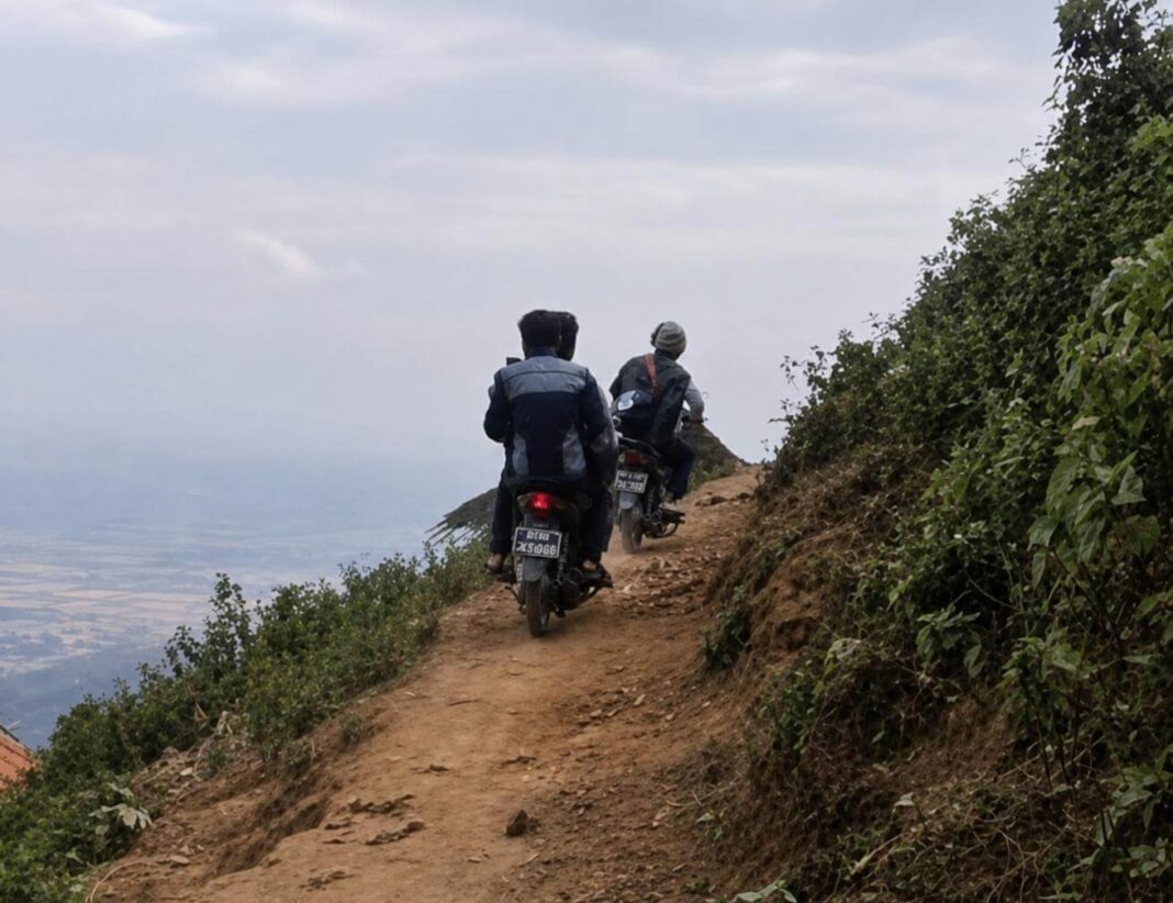 A mountain road in Kengtung Township, eastern Shan State, where poor conditions often prevent access to healthcare services