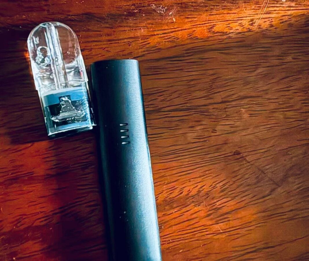 An e cigarette device and a “Happy Pod” cartridge