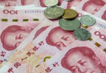 Chinese Yuan Expansion Fuels Price Hikes in Northern Shan’s Hsenwi Chinese Yuan banknotes and coins
