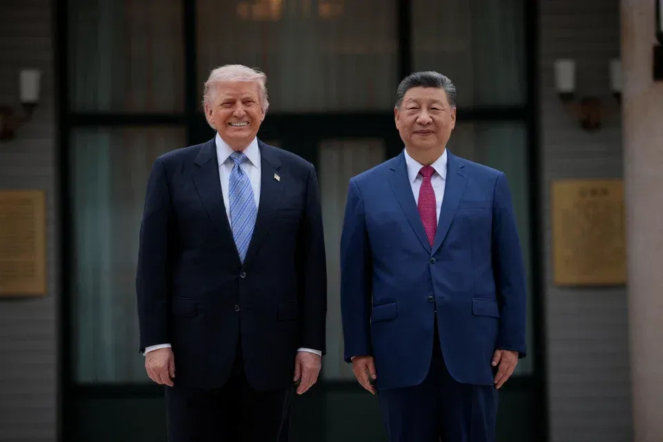 Donald Trump and Xi Jinping pose for a photograph during the visit