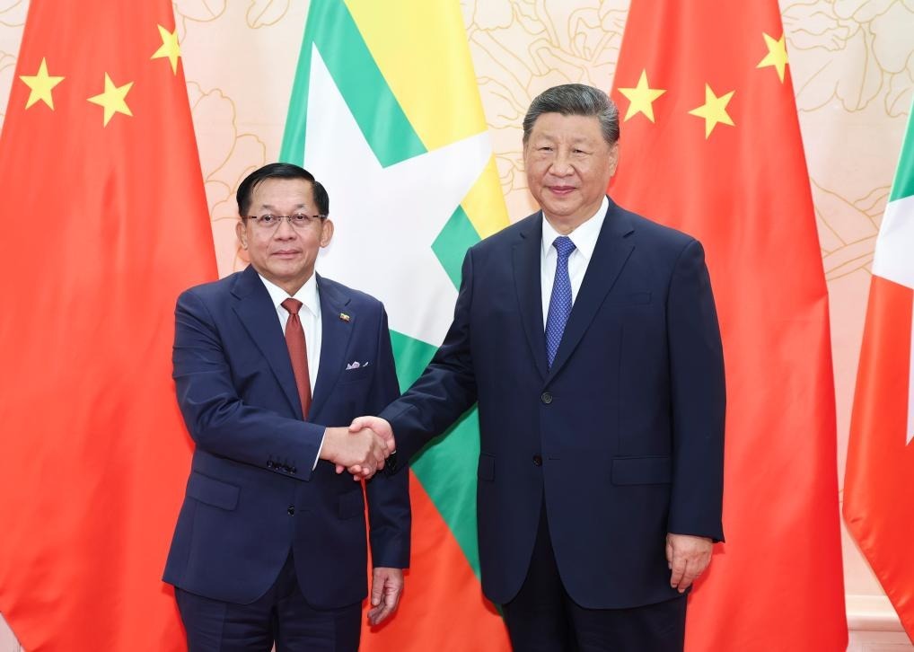 Handshake between Xi Jinping and Min Aung Hlaing Handshake between Xi Jinping and Min Aung Hlaing